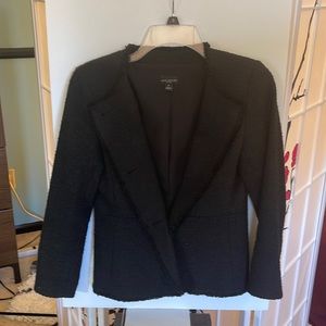 Like new Ann Taylor black blazer. Sz: 00. 78% polyester/20% cotton Machine wash.